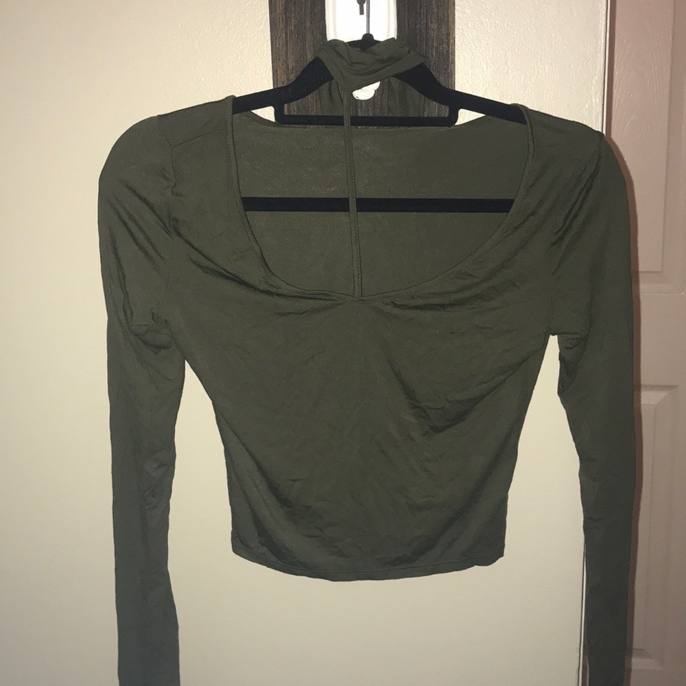 Green long sleeved top